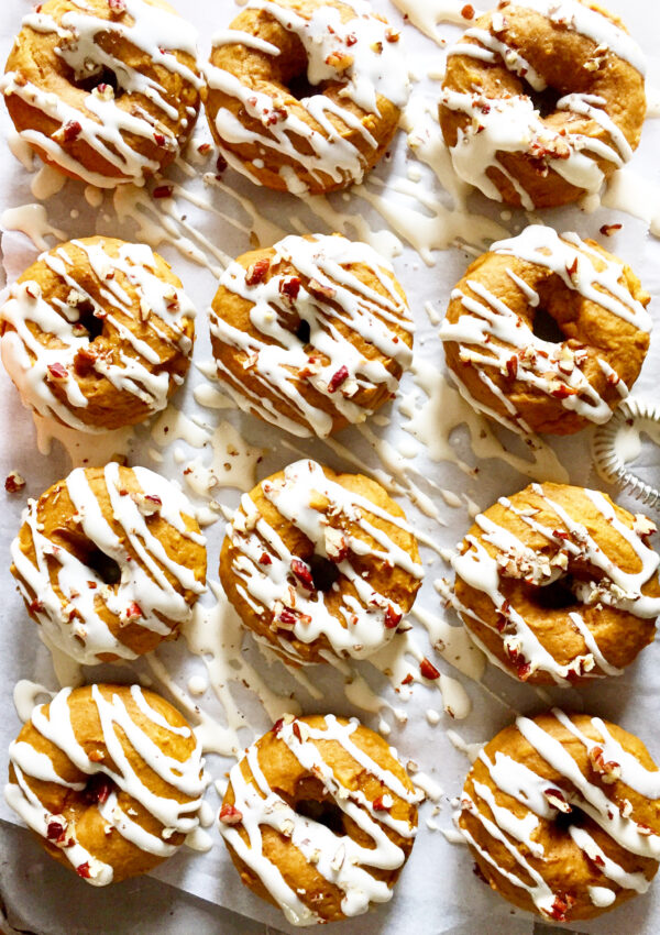 Baked Pumpkin Doughnuts with Maple Cream Cheese Glaze. - harvestandnourish.com