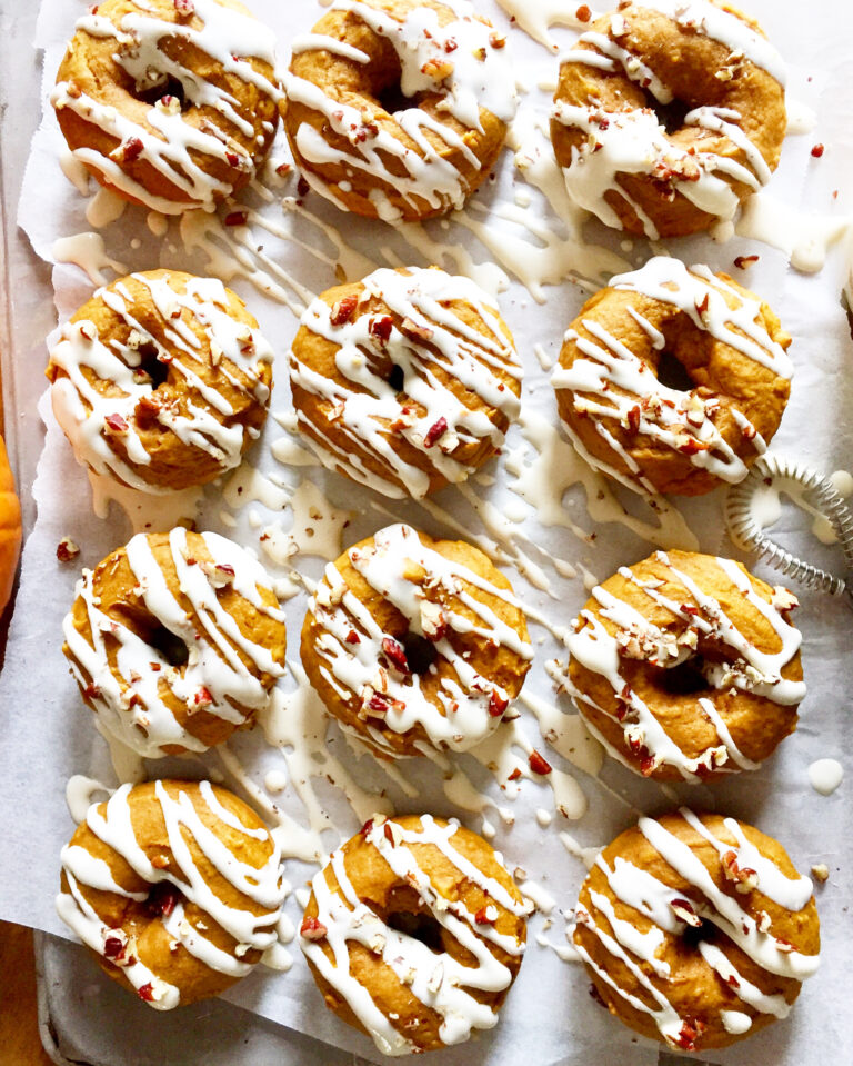 Baked Pumpkin Doughnuts with Maple Cream Cheese Glaze. - harvestandnourish.com