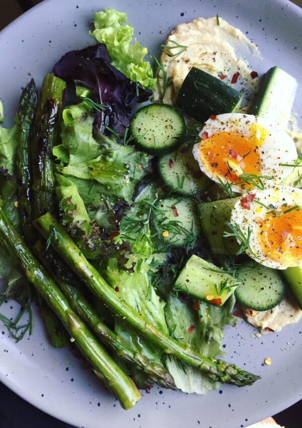 Spring Greens Salad with Roasted Garlic Hummus+7-Minute Egg. - harvestandnourish.com