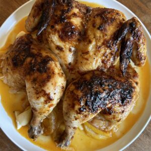 Spatchcock Harissa Butter Chicken. - harvestandnourish.com