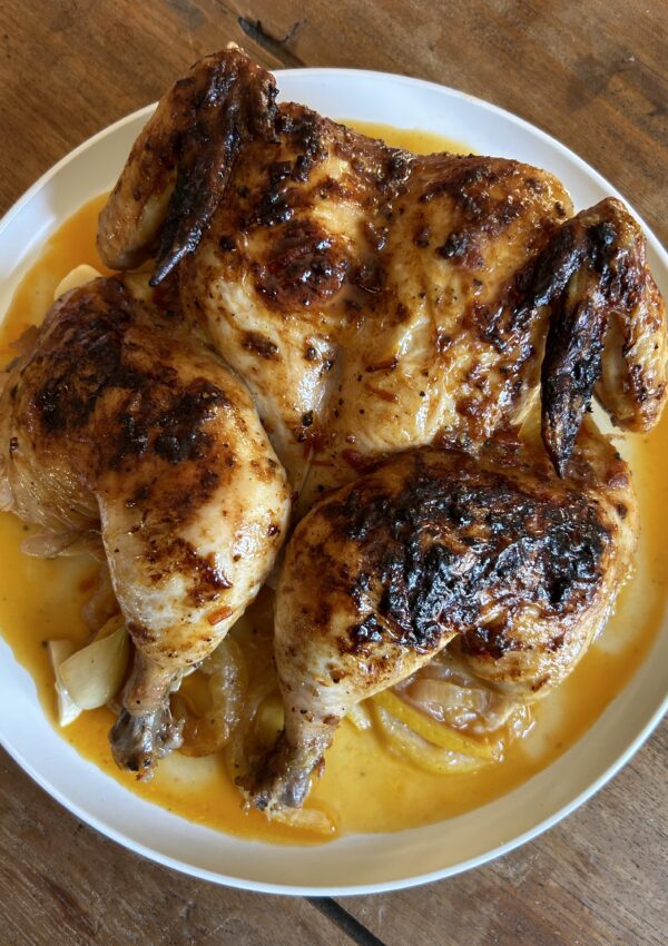 Spatchcock Harissa Butter Chicken. - harvestandnourish.com