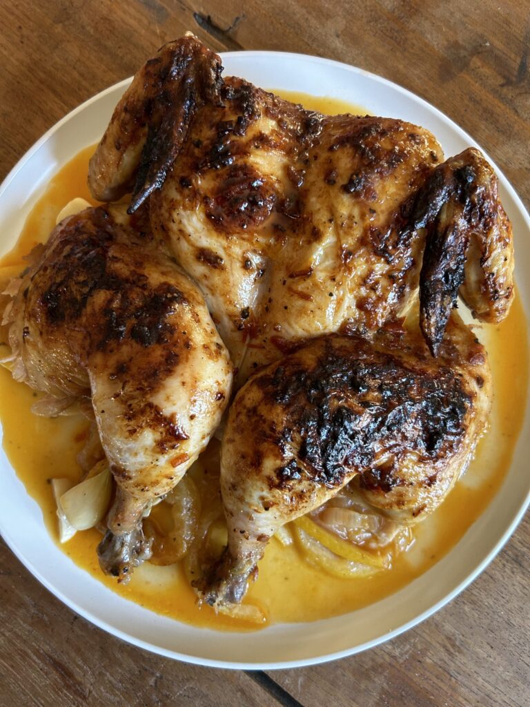 Spatchcock Harissa Butter Chicken. - harvestandnourish.com